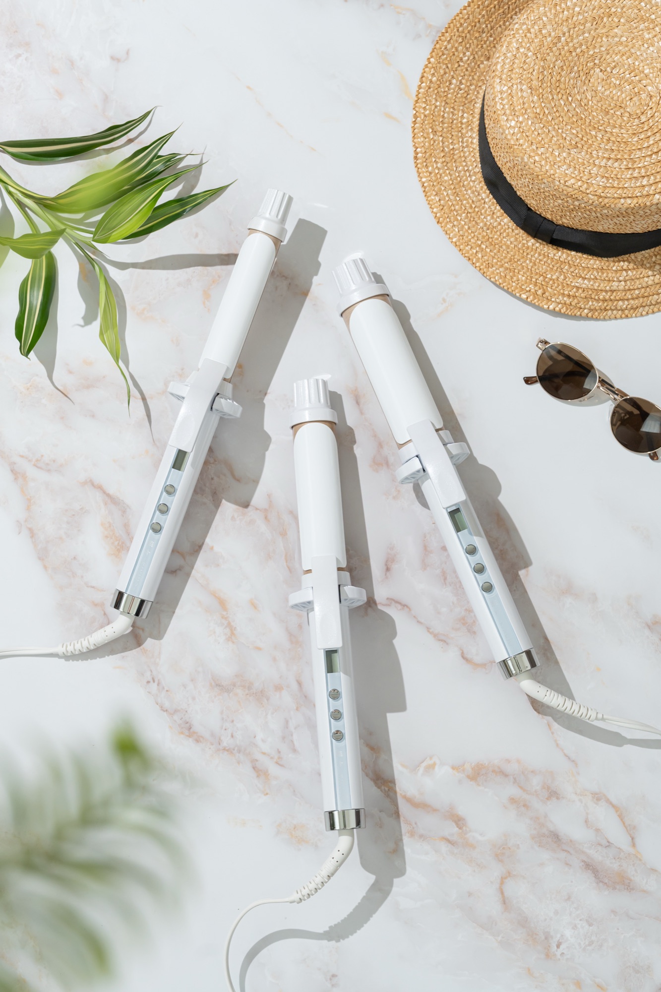 KINUJO Curling Iron lineup on marble